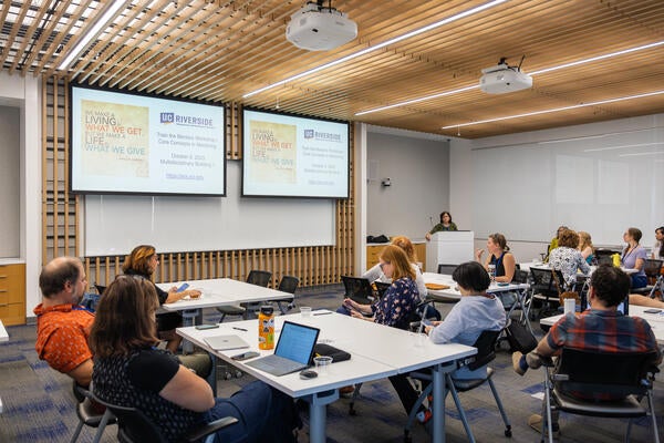 Individuals viewing presentation